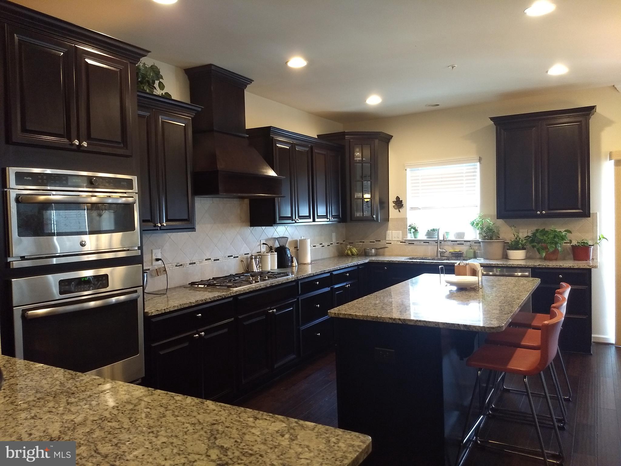 8010 Ravenclaw Road Elkridge, MD 21075 - Photo 2 of 30 Kitchen is a Chef's delight. Double Oven. Granite
