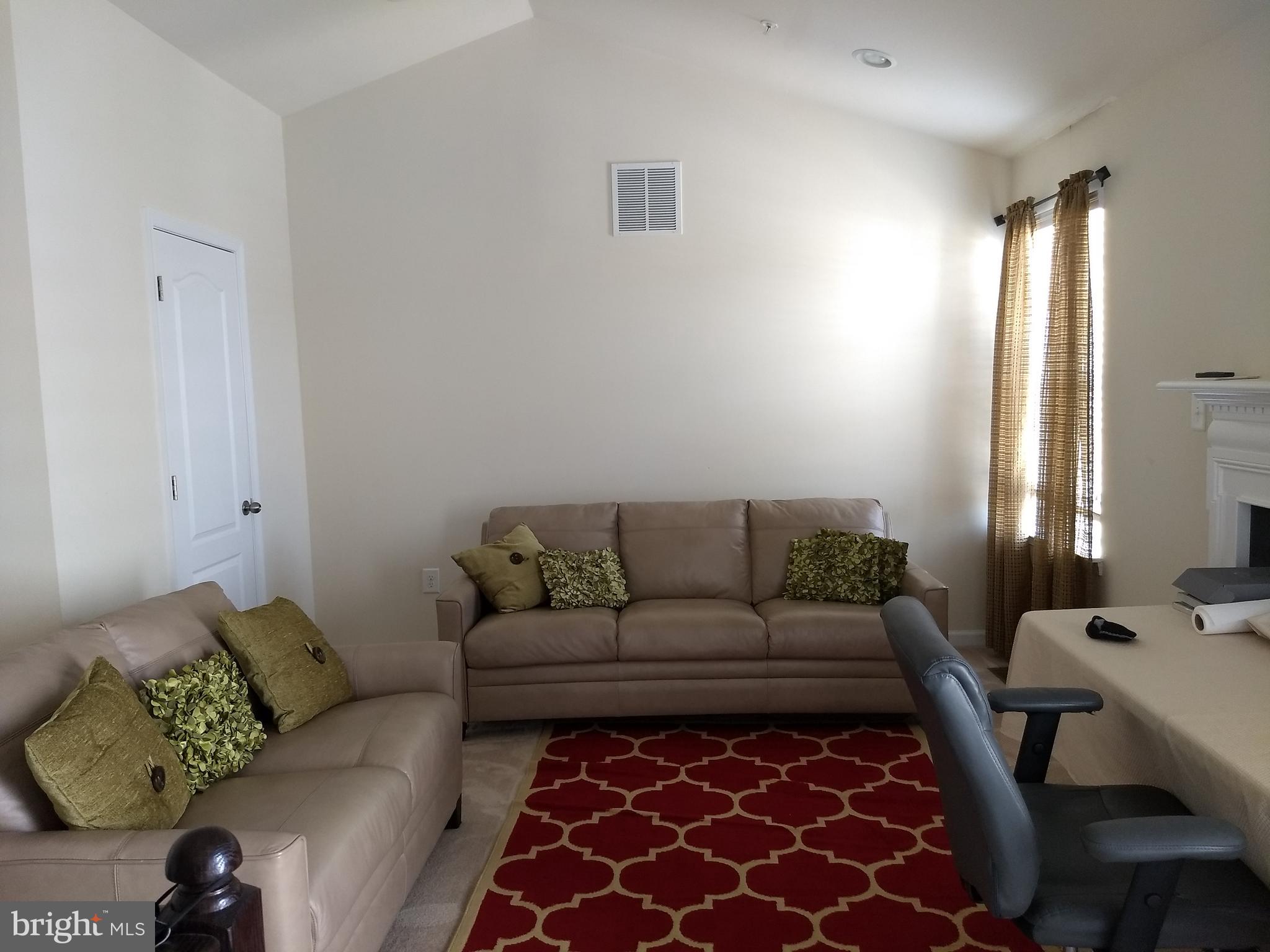 8010 Ravenclaw Road Elkridge, MD 21075 - Photo 11 of 30 4th Floor Loft has cathedral ceiling