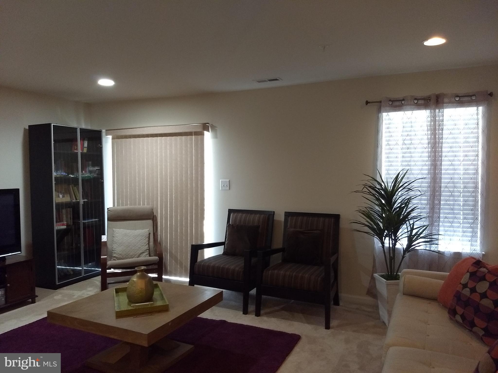 8010 Ravenclaw Road Elkridge, MD 21075 - Photo 25 of 30 WALKOUT Basement has FULL-SIZE Window & BIG door