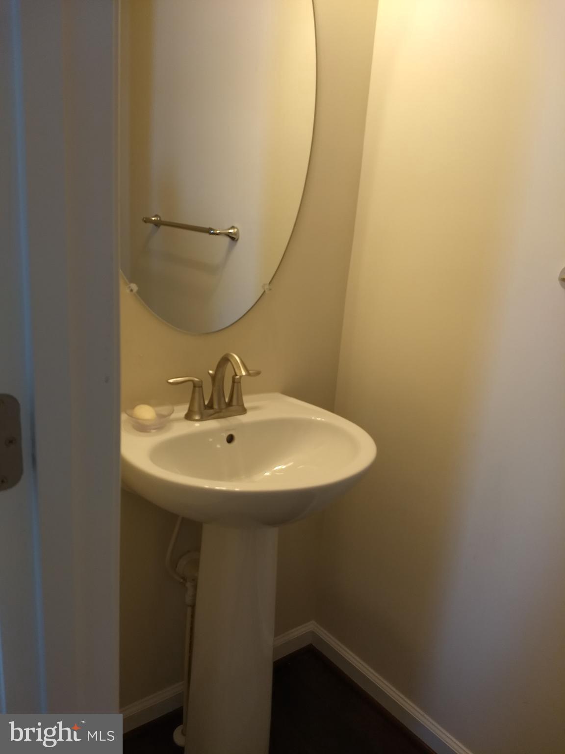 8010 Ravenclaw Road Elkridge, MD 21075 - Photo 26 of 30 Powder room has beautiful pedestal sink