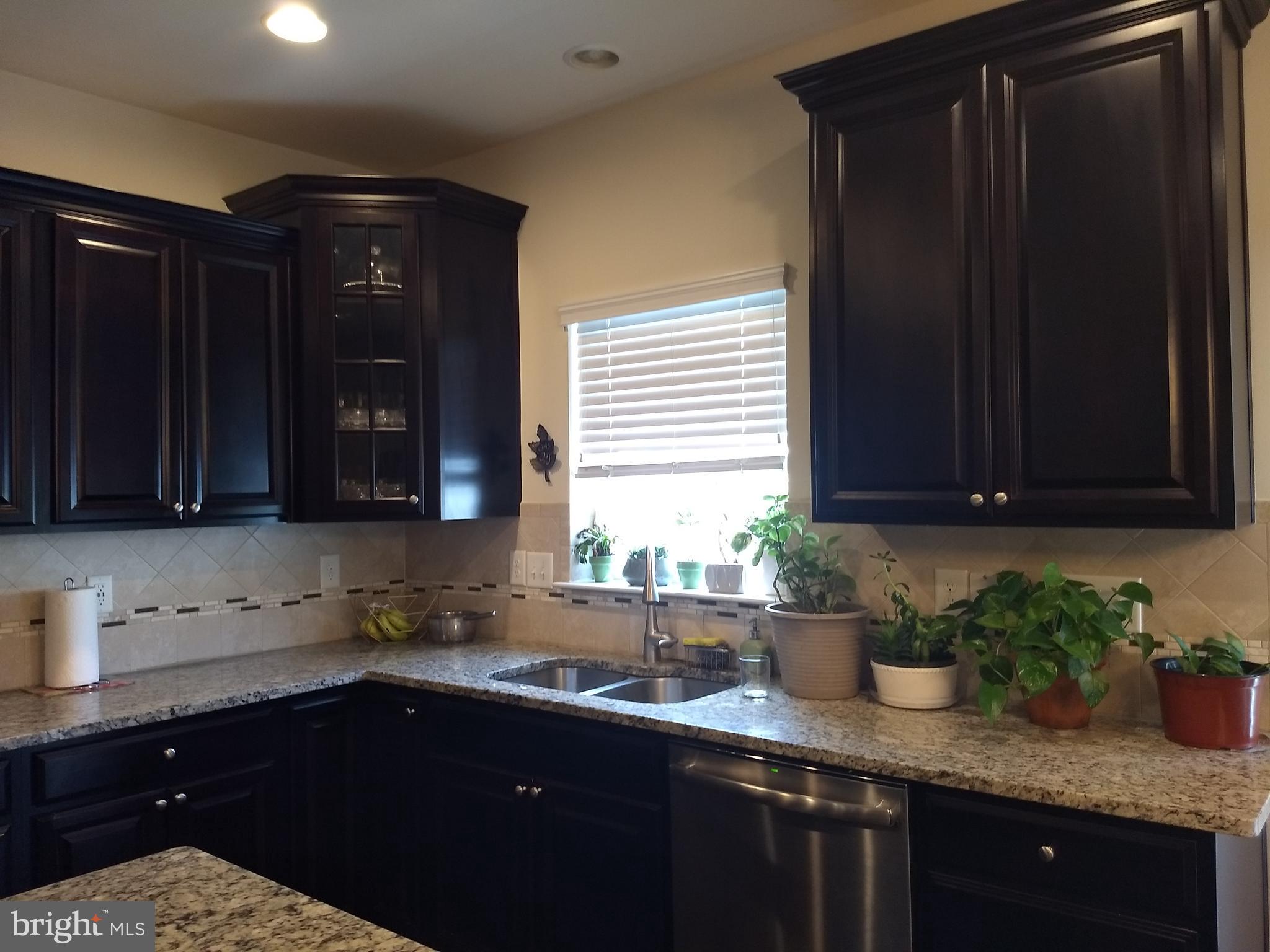 8010 Ravenclaw Road Elkridge, MD 21075 - Photo 4 of 30 Cherry Cabinets. Back Splash. Double Oven