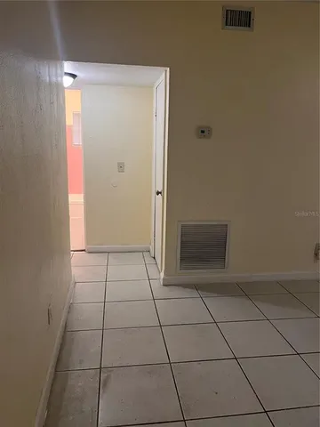 a view of a kitchen with cabinets