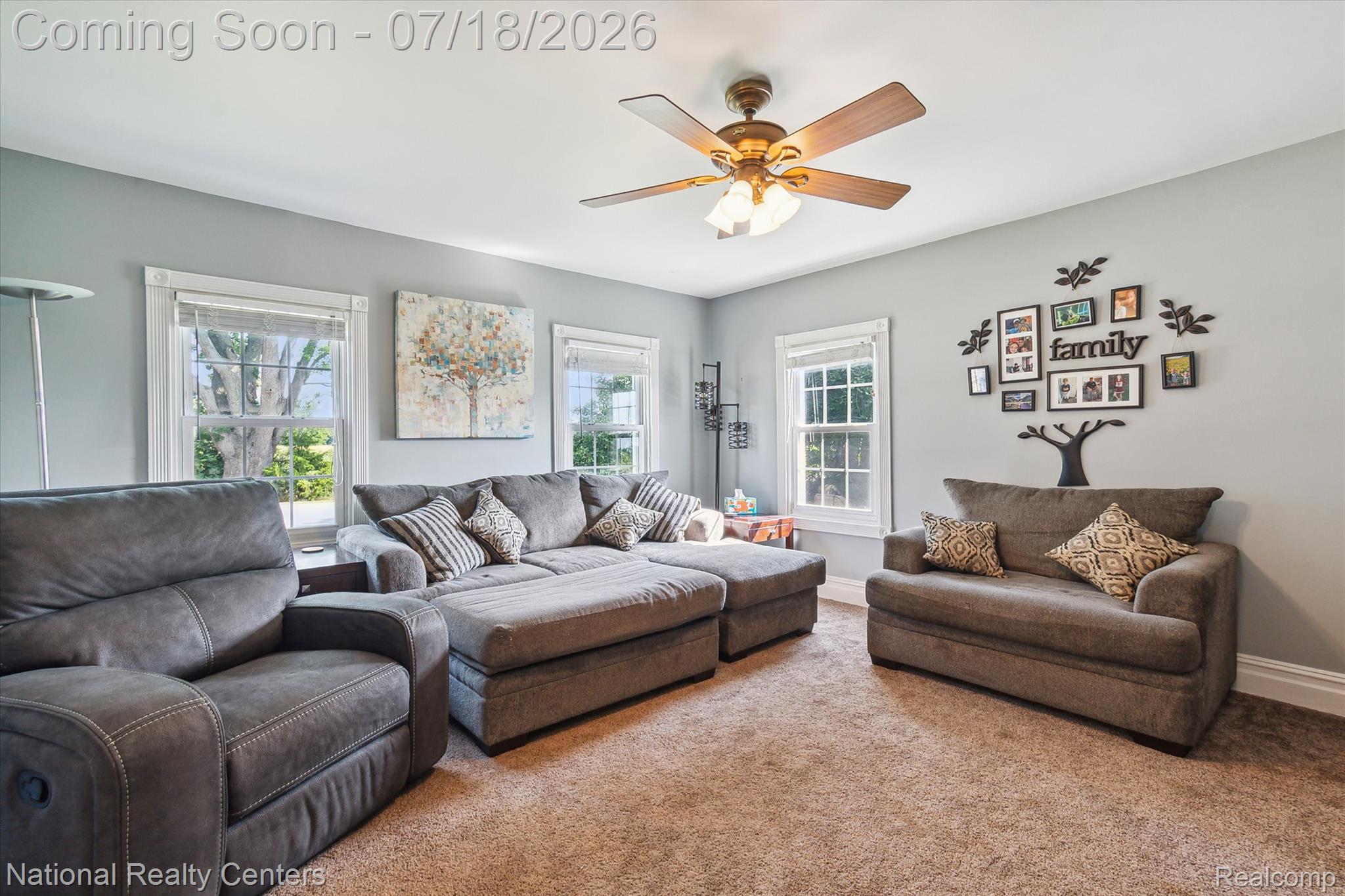 9589 Clinton Macon Road Tecumseh, MI 49286 - Photo 9 of 48 Light gray wall paint complements the neutral-toned carpet flooring