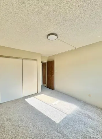 a bathroom with a double vanity sink toilet and a bathtub