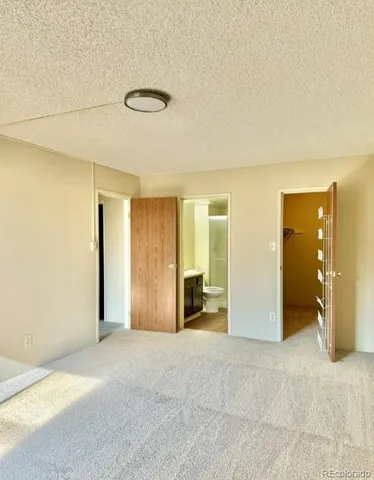 a view of a livingroom with a flat screen tv