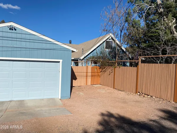 a view of a house with a garage