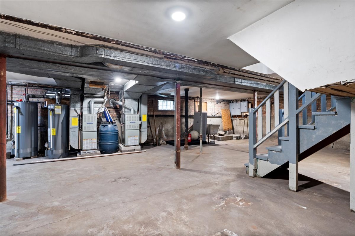 852 East 88th Place Chicago, IL 60619 - Photo 25 of 28 a view of a room with gym equipment
