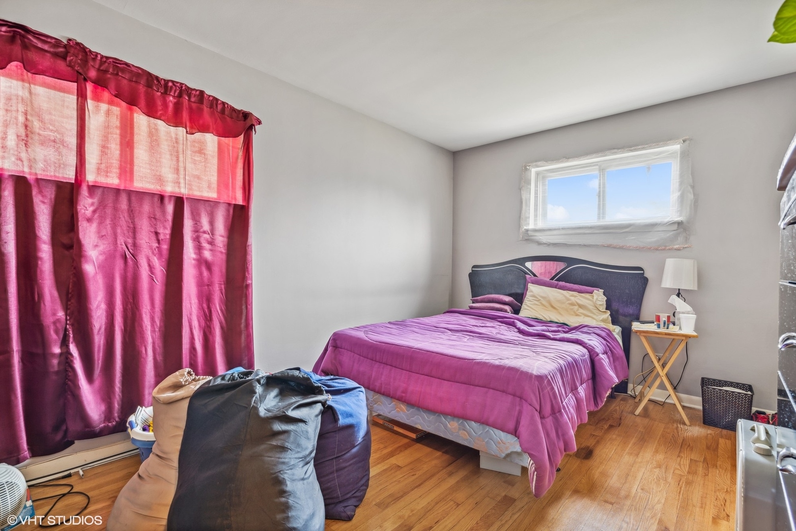 852 East 88th Place Chicago, IL 60619 - Photo 9 of 28 a bedroom with a bed and a window