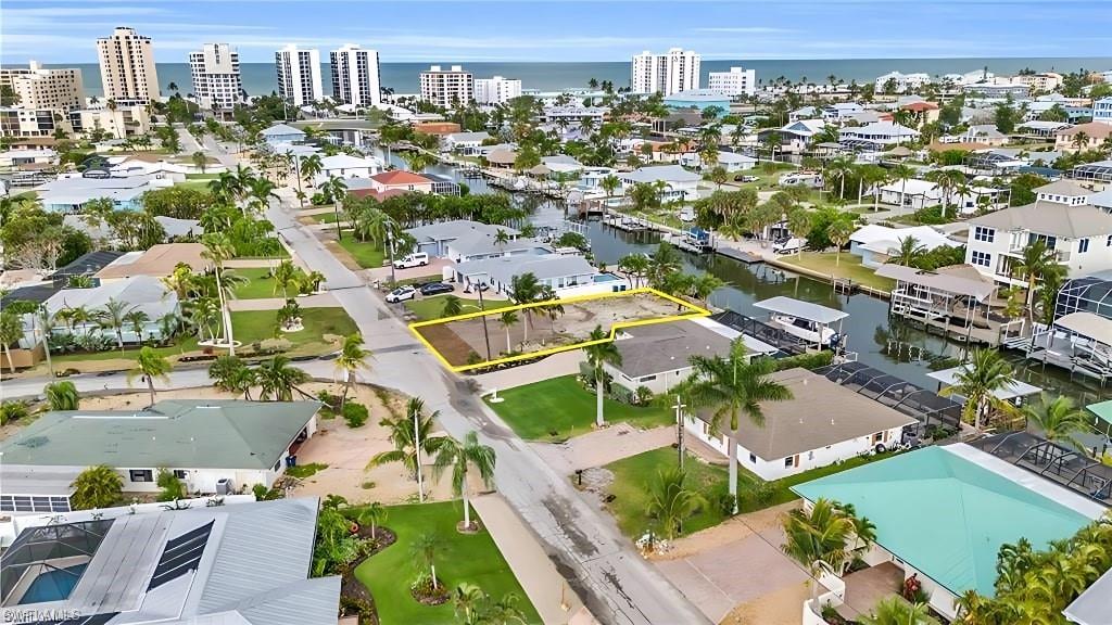 231 Albatross Street Fort Myers Beach, FL 33931 - Photo 16 of 18 an aerial view of residential houses with outdoor space