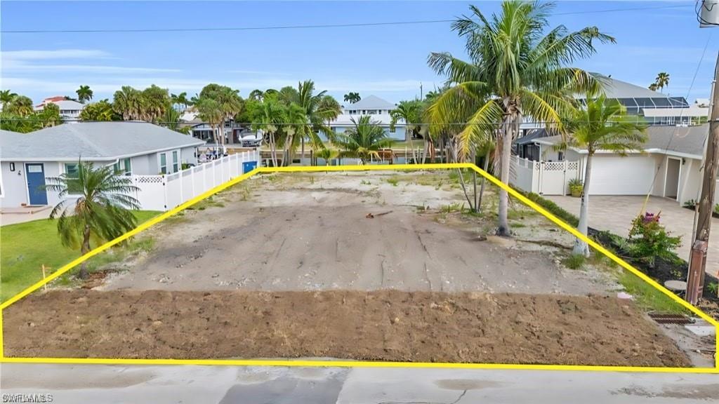 231 Albatross Street Fort Myers Beach, FL 33931 - Photo 4 of 18 a view of swimming pool with a yard