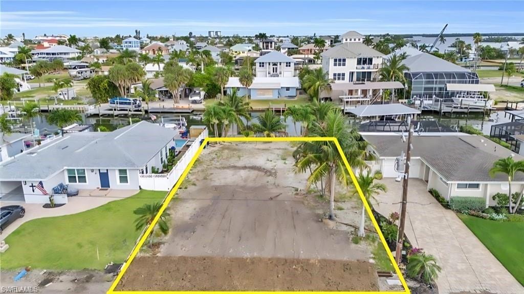 231 Albatross Street Fort Myers Beach, FL 33931 - Photo 5 of 18 an aerial view of residential houses with outdoor space and swimming pool