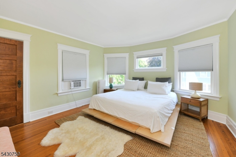42 Norman Road Montclair, NJ 07043 - Photo 17 of 33 a bedroom with a bed and window