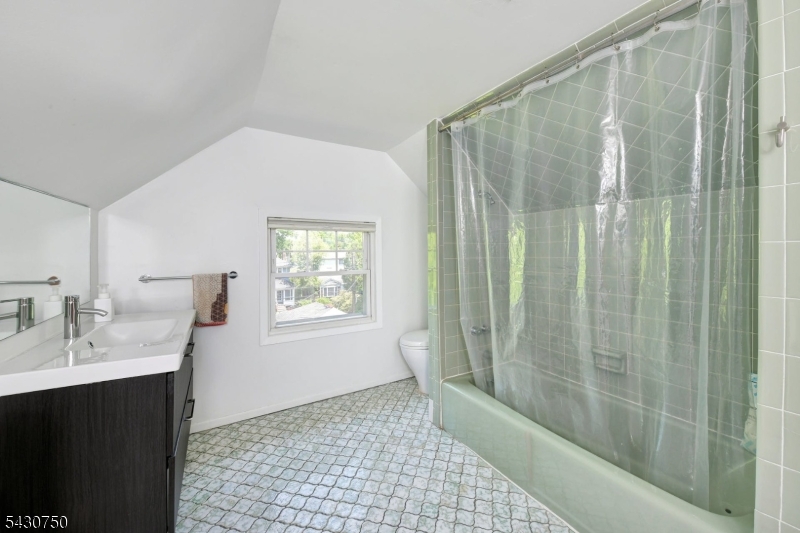 42 Norman Road Montclair, NJ 07043 - Photo 27 of 33 a bathroom with a shower and a sink