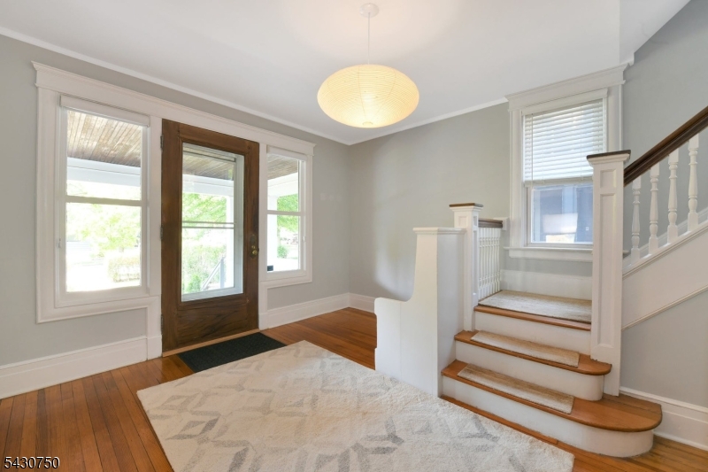 42 Norman Road Montclair, NJ 07043 - Photo 5 of 33 a view of a livingroom with wooden floor and window