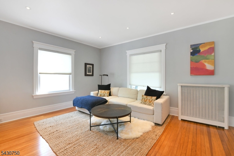 42 Norman Road Montclair, NJ 07043 - Photo 7 of 33 a living room with furniture and a window