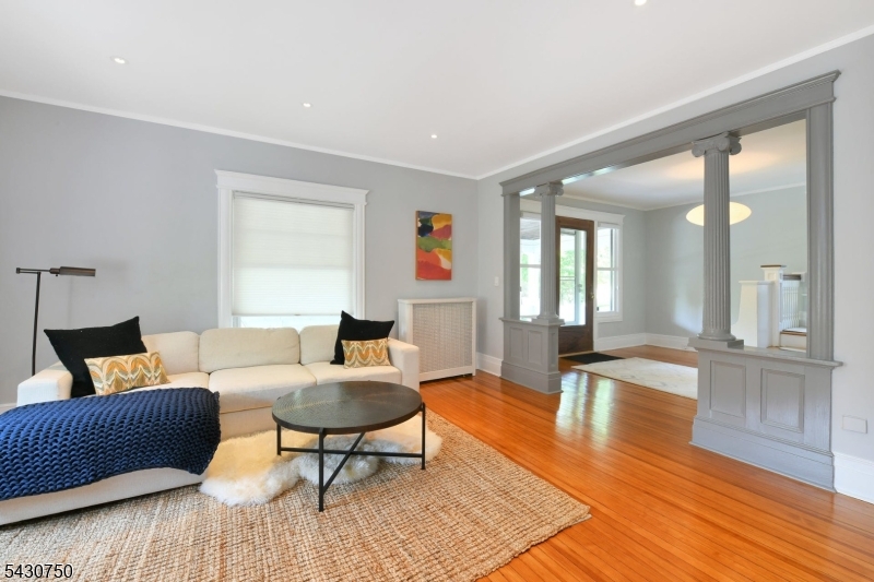 42 Norman Road Montclair, NJ 07043 - Photo 8 of 33 a living room with furniture and a table
