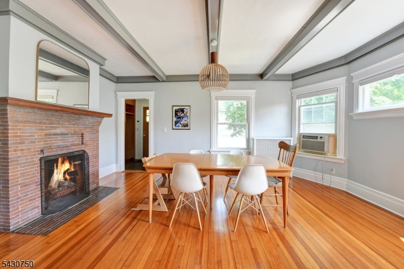 42 Norman Road Montclair, NJ 07043 - Photo 10 of 33 a dining room with furniture and wooden floor