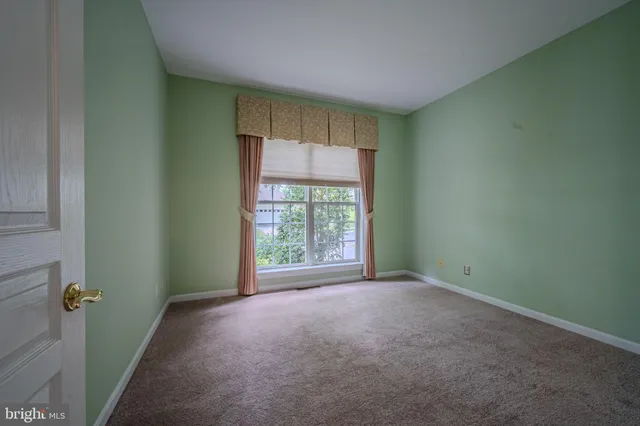 a view of a livingroom with a window