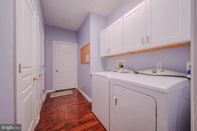 a view of a livingroom with a ceiling fan and window