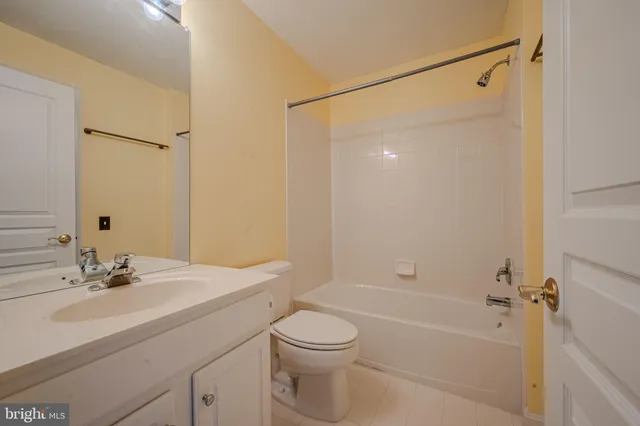 a view of an empty room and garage