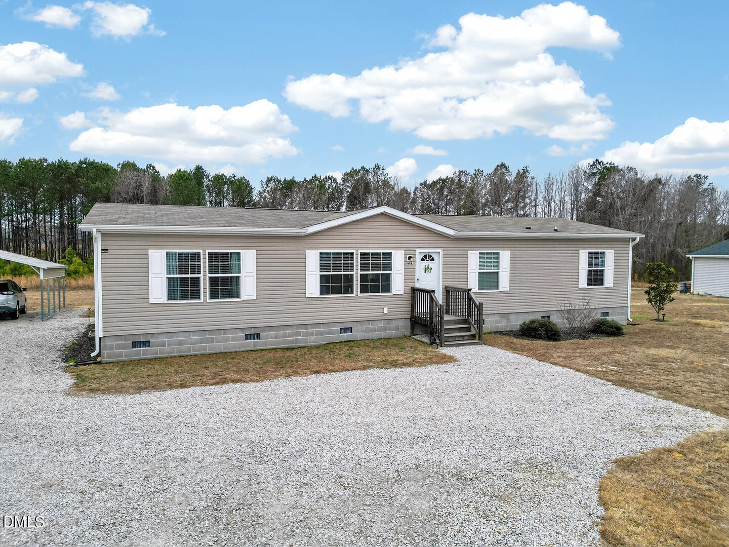 540 Pine Ridge Road Zebulon, NC 27597 - Photo 62 of 96 a view of a house with backyard and sitting area