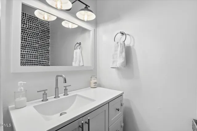 a view of a dining room with furniture and window