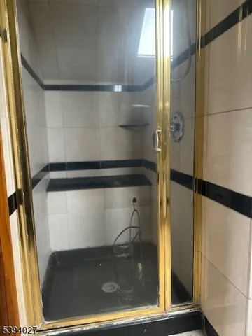 a view of an empty room with a balcony