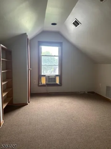 a view of deck with wooden floor and fence