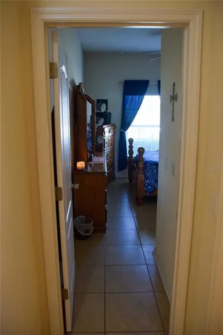 a hallway with view of living room