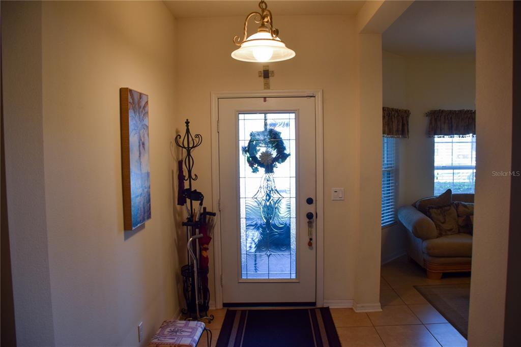 3500 Sprite Lane St. Cloud, FL 34772 - Photo 25 of 52 a dining room with furniture and chandelier