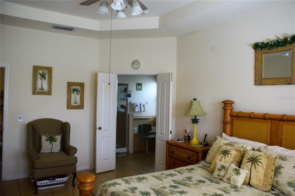 3500 Sprite Lane St. Cloud, FL 34772 - Photo 40 of 52 a bedroom with a bed and furniture
