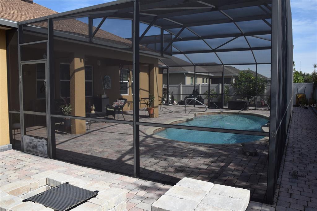 3500 Sprite Lane St. Cloud, FL 34772 - Photo 47 of 52 a view of a porch with a table and chairs
