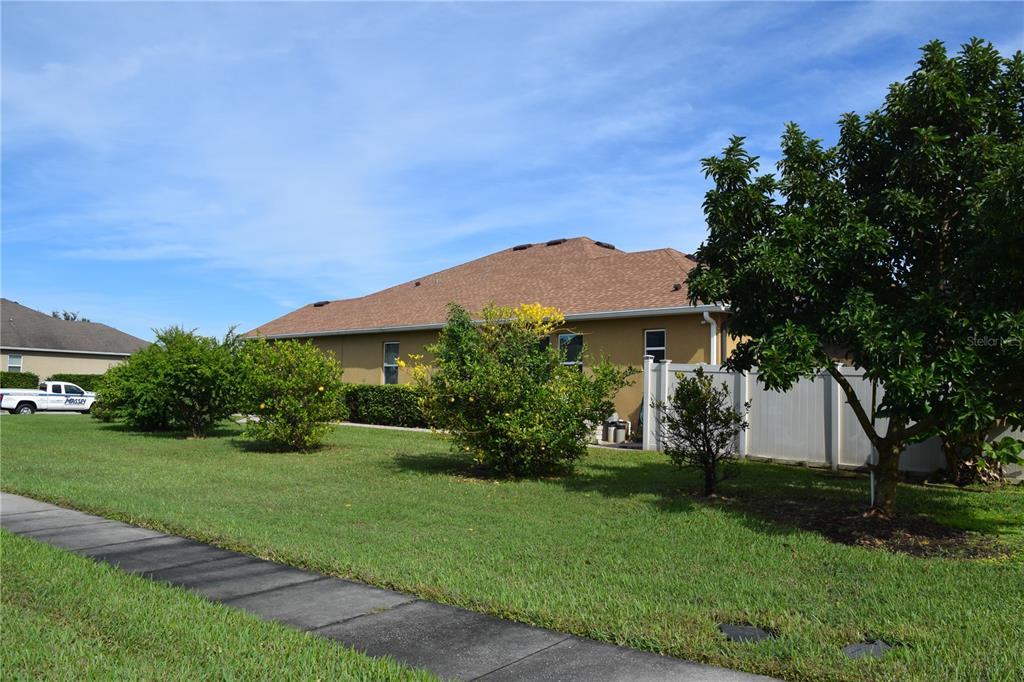 3500 Sprite Lane St. Cloud, FL 34772 - Photo 48 of 52 a view of a house with garden