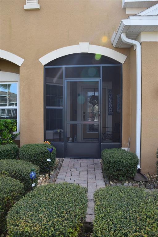 3500 Sprite Lane St. Cloud, FL 34772 - Photo 6 of 52 a front view of a house with garden