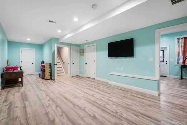 a view of a livingroom with a flat screen tv