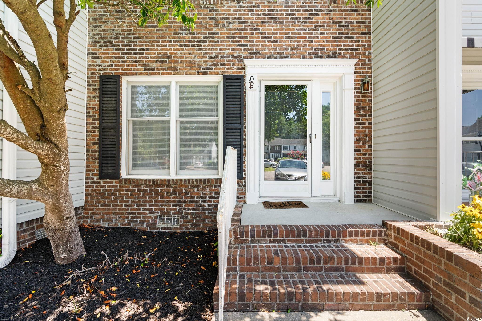 4115 Little River Road, Unit 10E Myrtle Beach, SC 29577 - Photo 3 of 23 Entrance to property with brick siding
