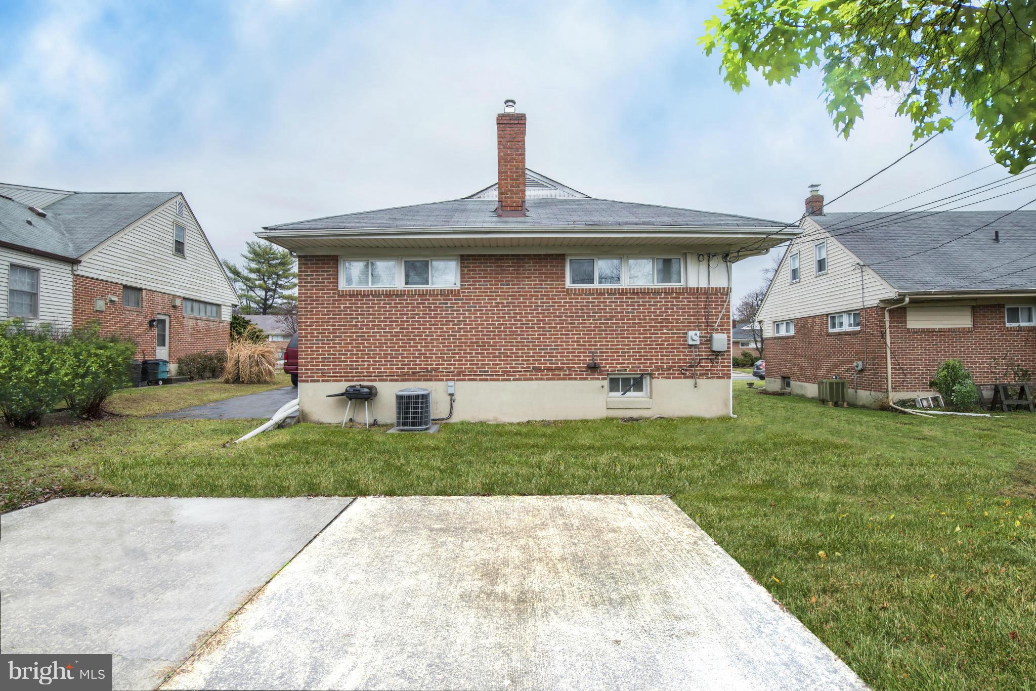 7415 Sudbrook Road Baltimore, MD 21208 - Photo 13 of 13 a front view of a house with garden