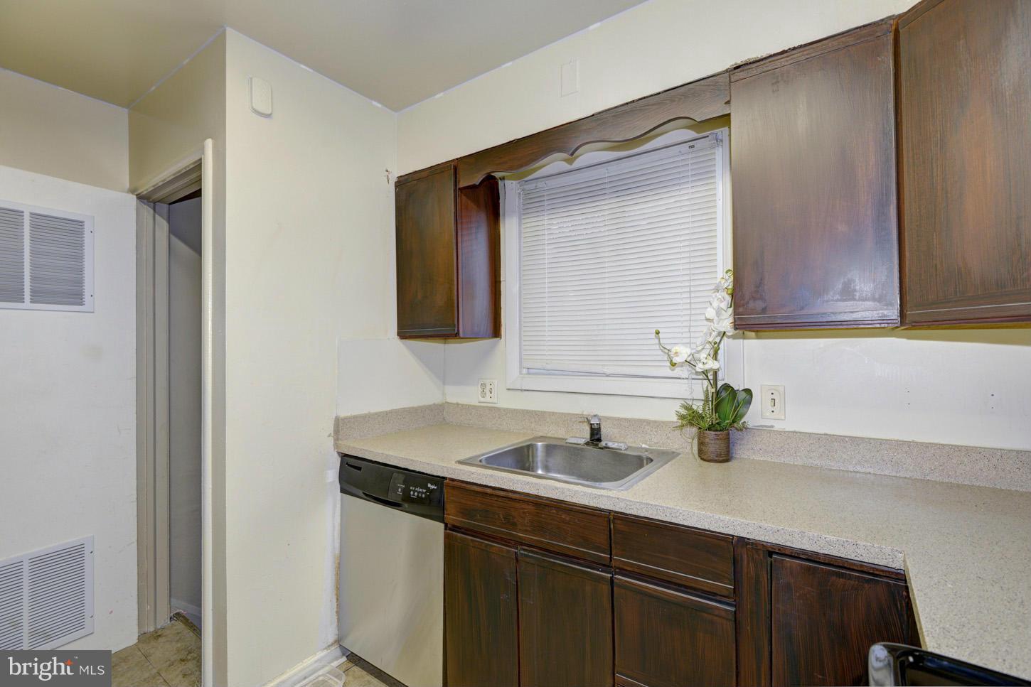 7415 Sudbrook Road Baltimore, MD 21208 - Photo 8 of 13 a bathroom with a sink and a mirror