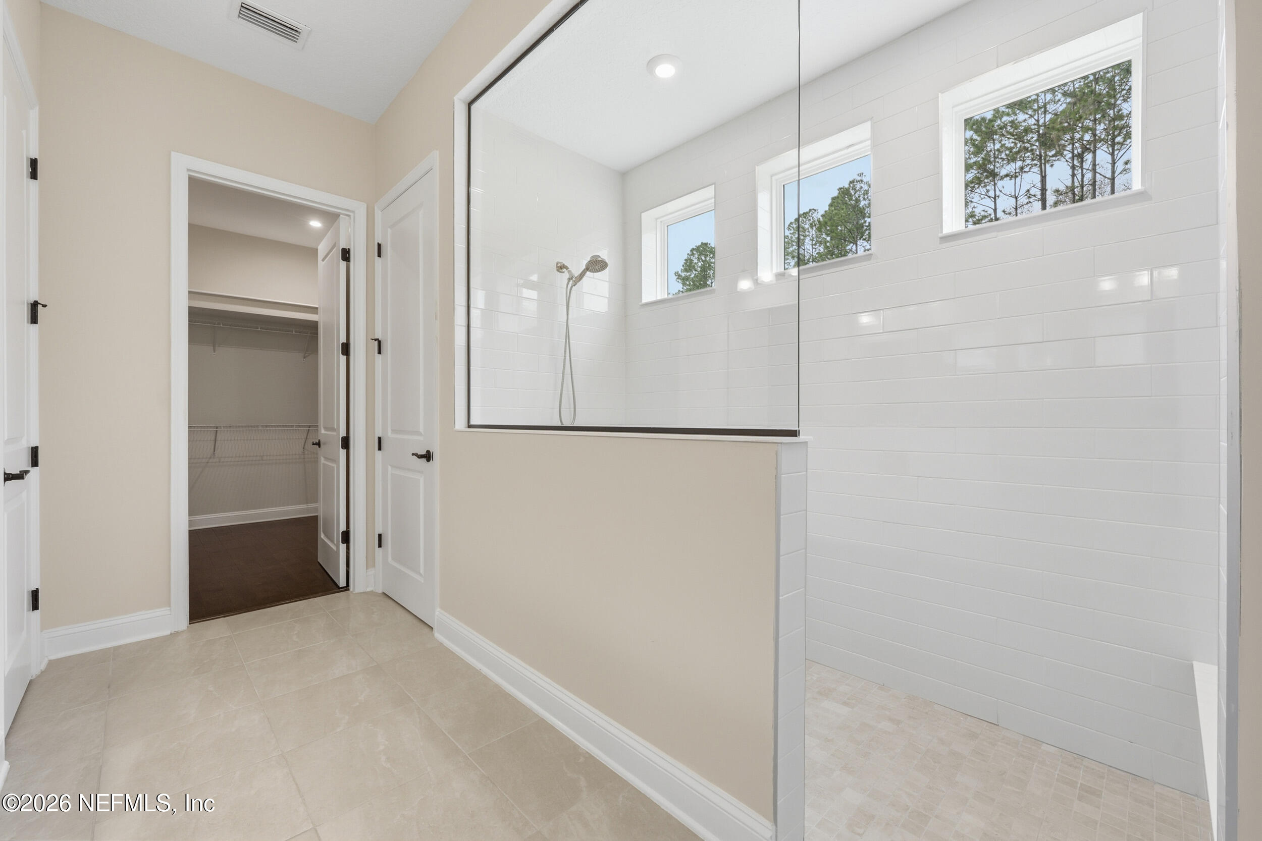 130 Key Grass Court St. Johns, FL 32259 - Photo 27 of 95 a view of bathroom with a shower and a sink