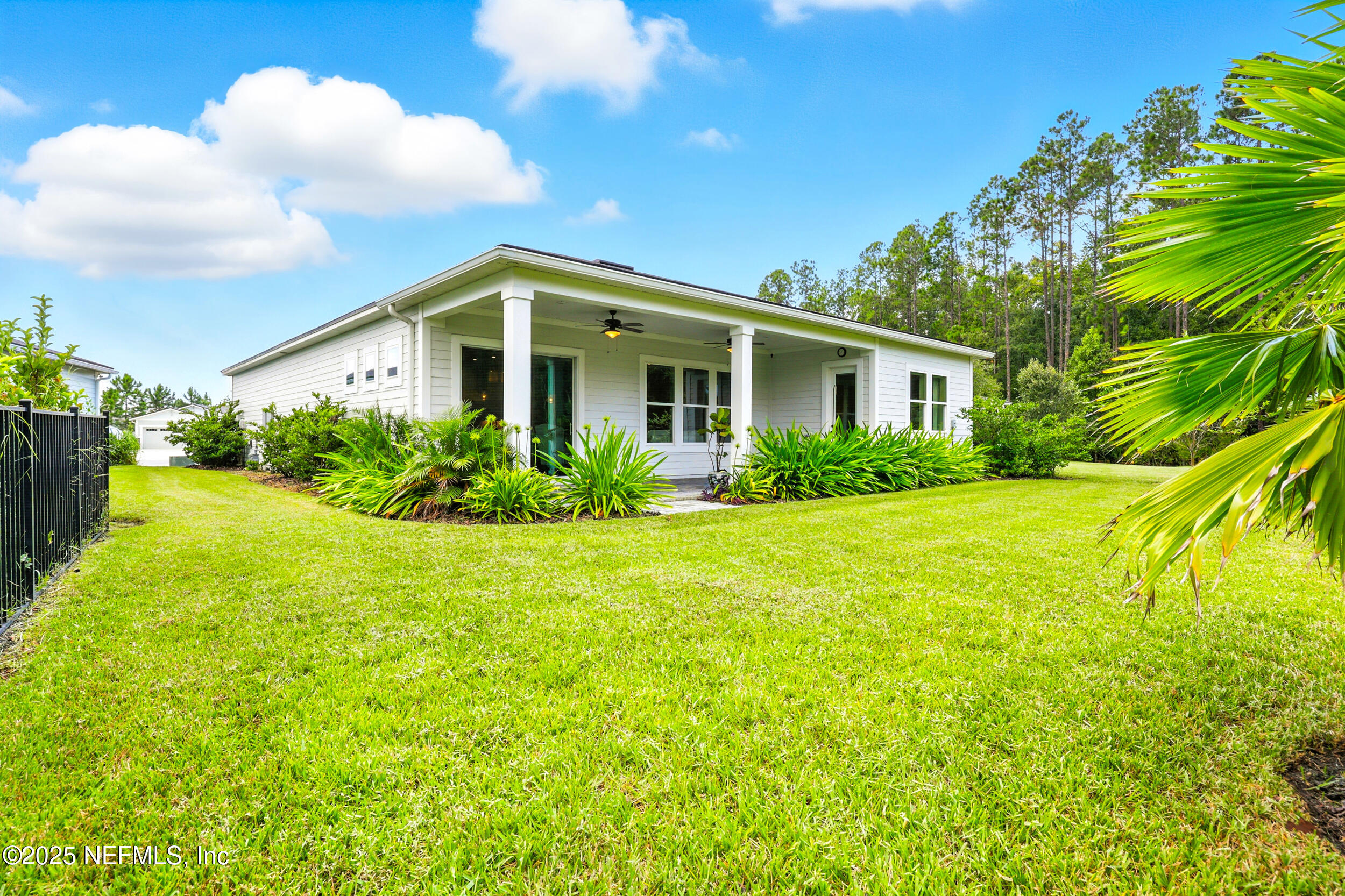130 Key Grass Court St. Johns, FL 32259 - Photo 43 of 95 a front view of house with yard and green space