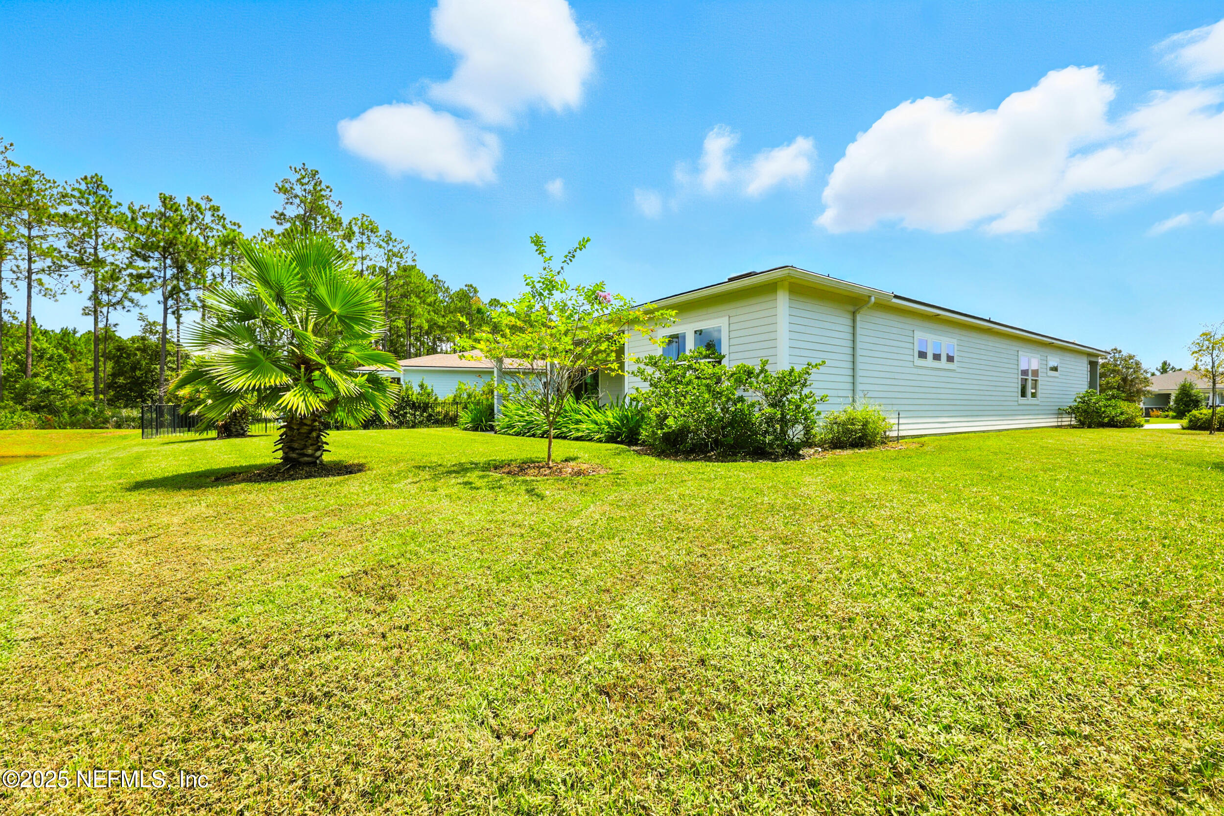 130 Key Grass Court St. Johns, FL 32259 - Photo 45 of 95 a big yard with swimming pool and green space