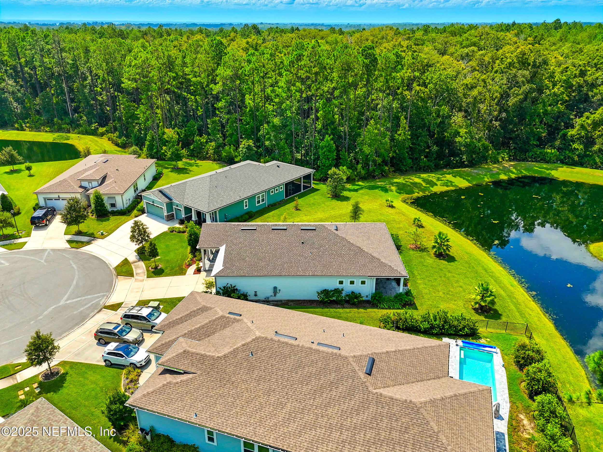 130 Key Grass Court St. Johns, FL 32259 - Photo 48 of 95 an aerial view of a house with swimming pool patio and yard