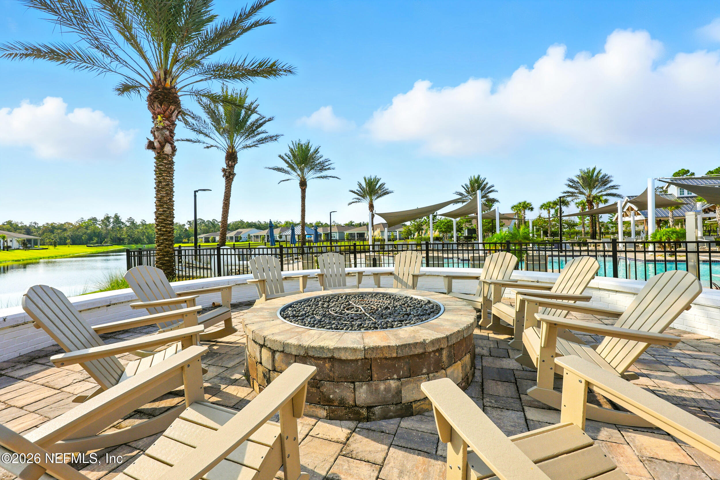 130 Key Grass Court St. Johns, FL 32259 - Photo 84 of 95 a view of a swimming pool with a lounge chairs