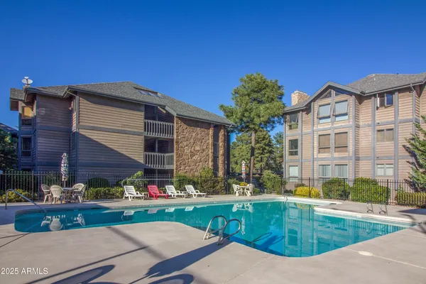 a view of a house with a swimming pool