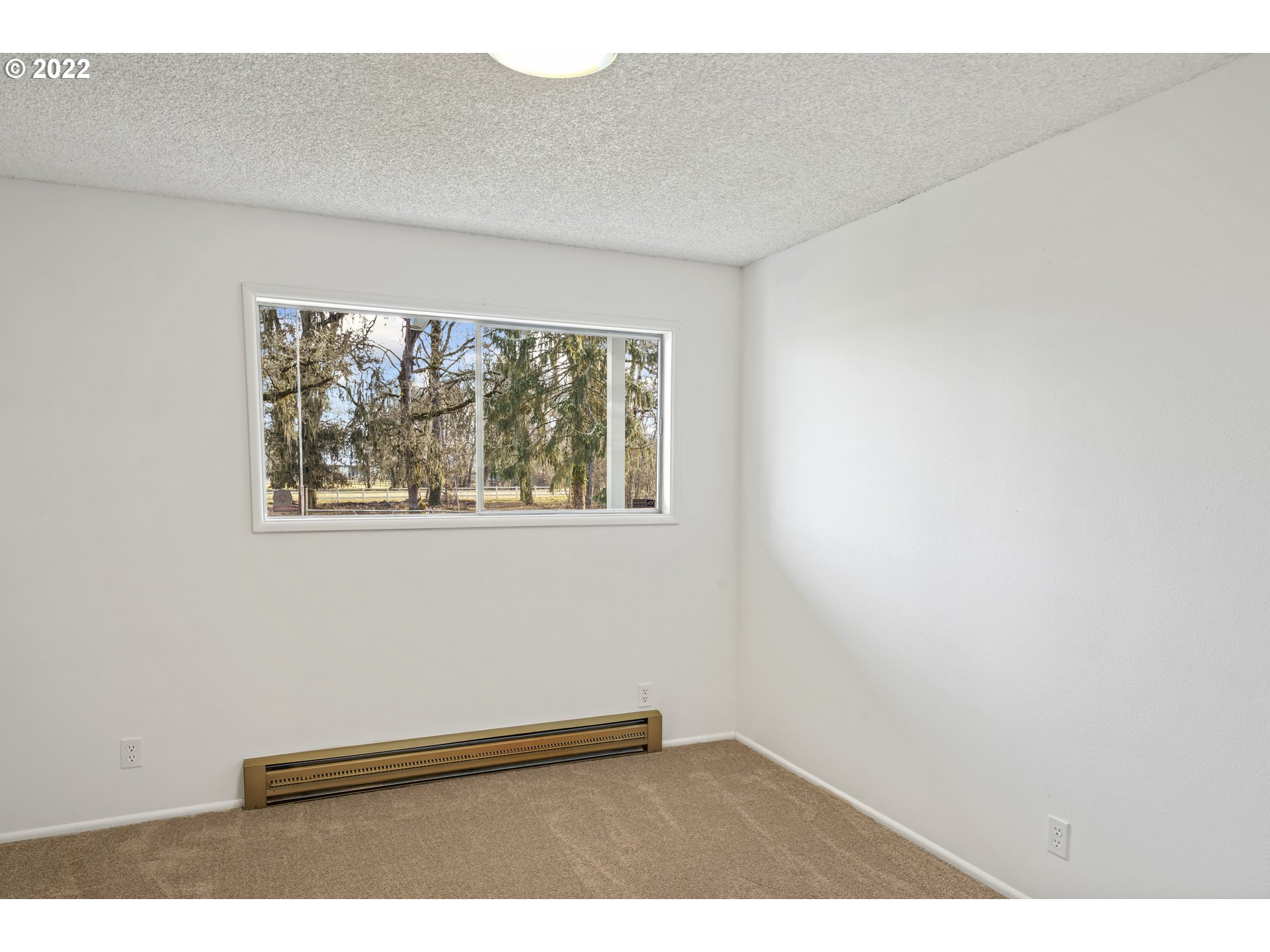 84926 Cloverdale Road Creswell, OR 97426 - Photo 19 of 31 a view of empty room with window