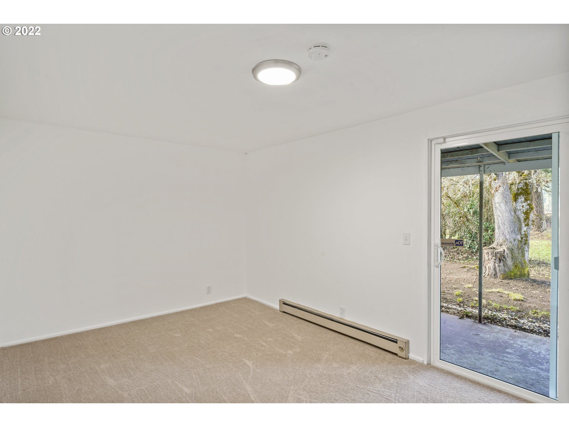 84926 Cloverdale Road Creswell, OR 97426 - Photo 21 of 31 a view of an empty room and window