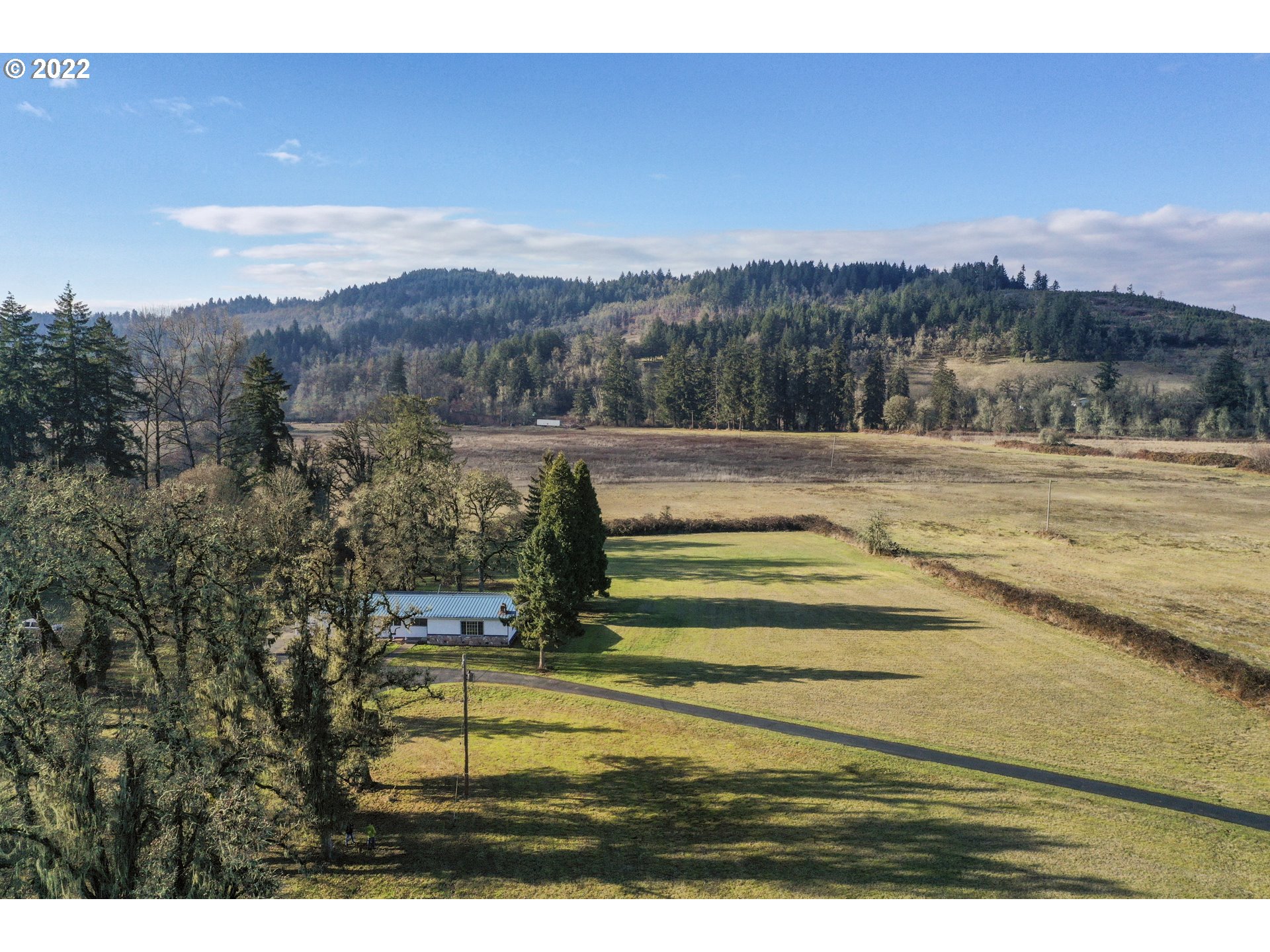 84926 Cloverdale Road Creswell, OR 97426 - Photo 26 of 31 a view of a town with mountains in the background