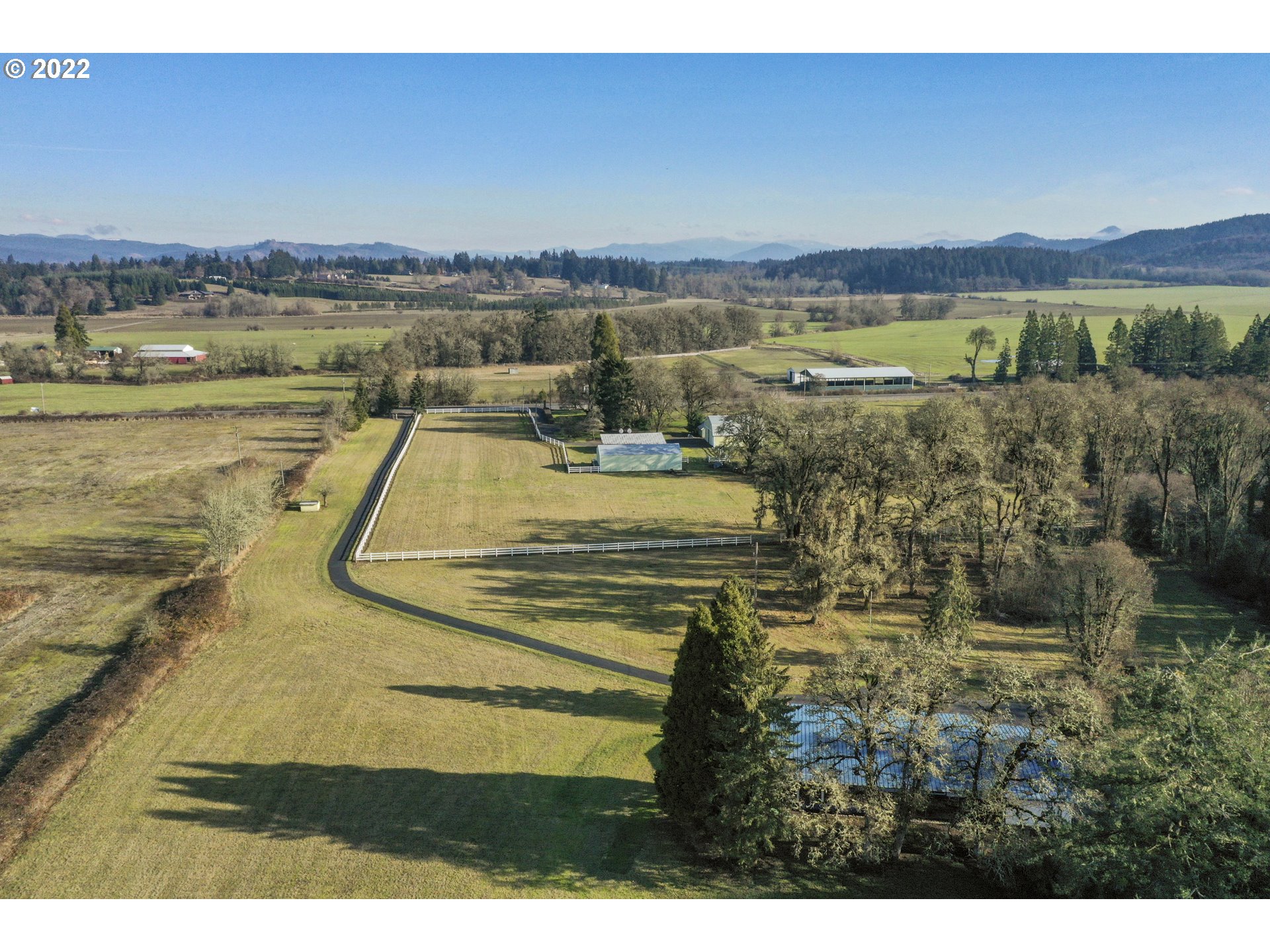 84926 Cloverdale Road Creswell, OR 97426 - Photo 27 of 31 a view of a lake with a mountain