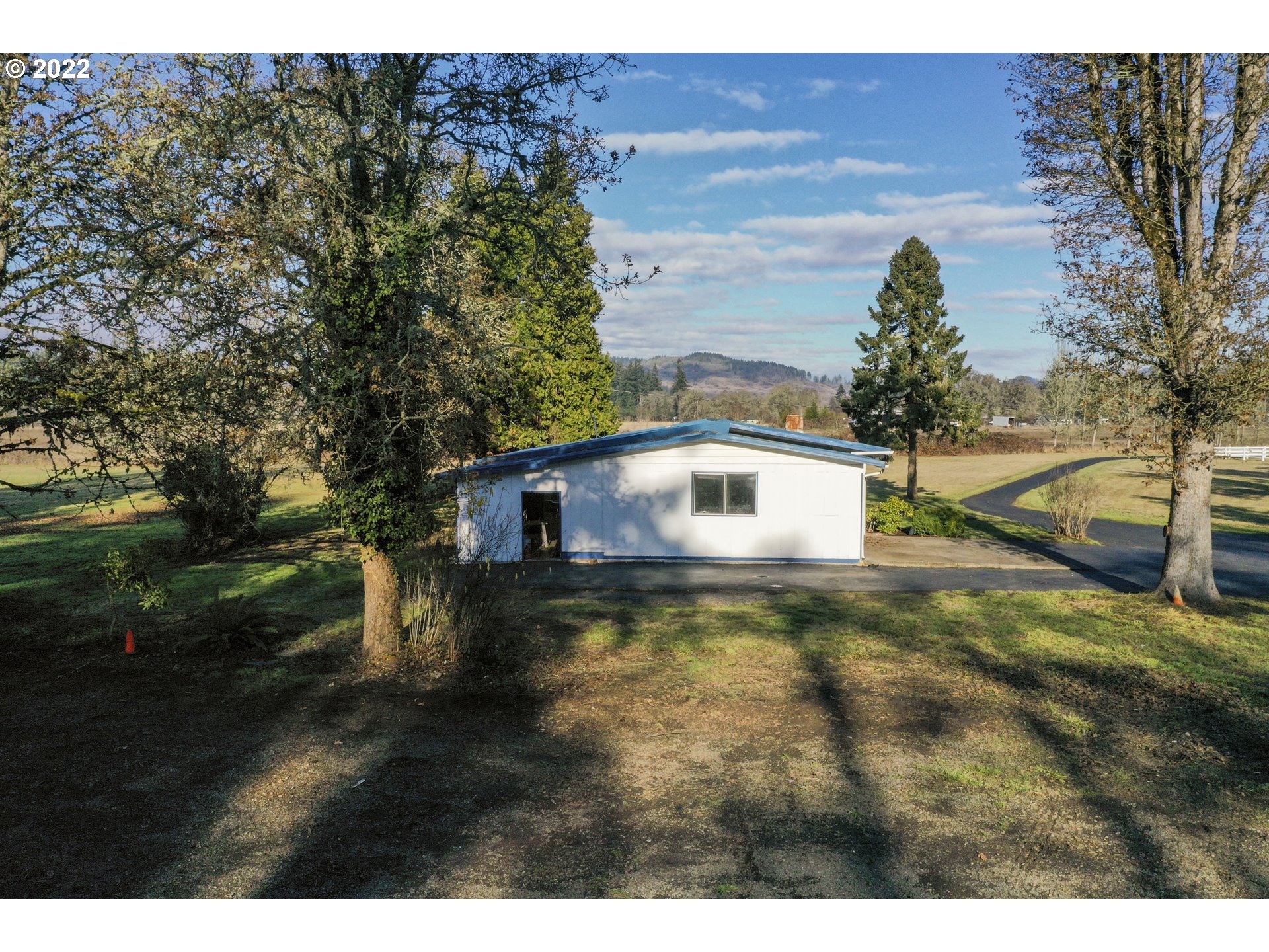 84926 Cloverdale Road Creswell, OR 97426 - Photo 28 of 31 a view of a back yard of the house