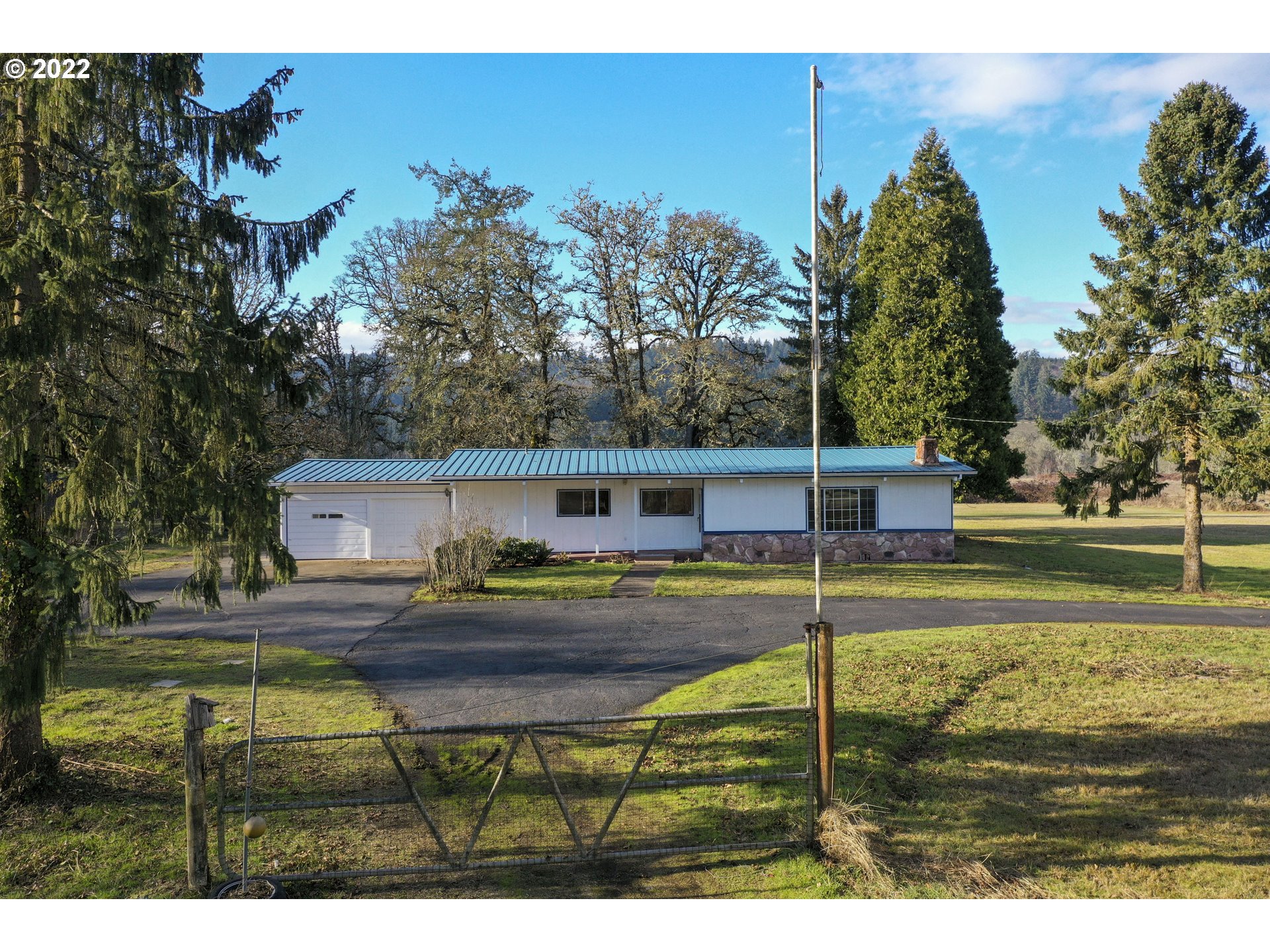 84926 Cloverdale Road Creswell, OR 97426 - Photo 3 of 31 a view of a house with a yard